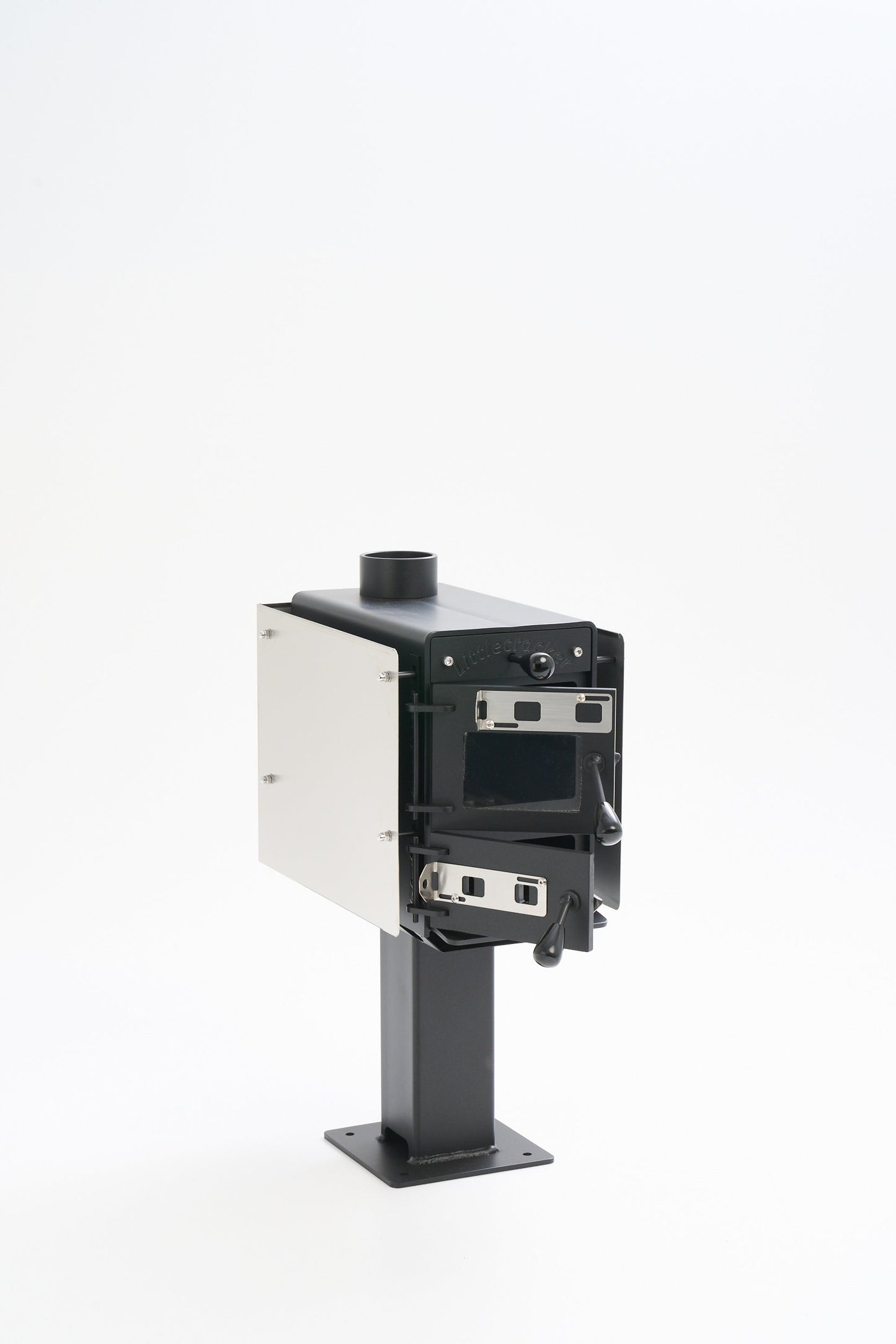 Little Cracker Multi-Fuel Fire with flue system, compact solid fuel heater.