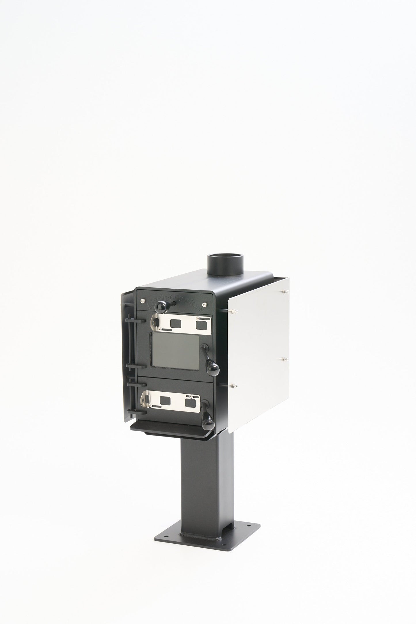 Little Cracker Multi-Fuel Fire with 4M flue system, compact wood/coal burner for small spaces.