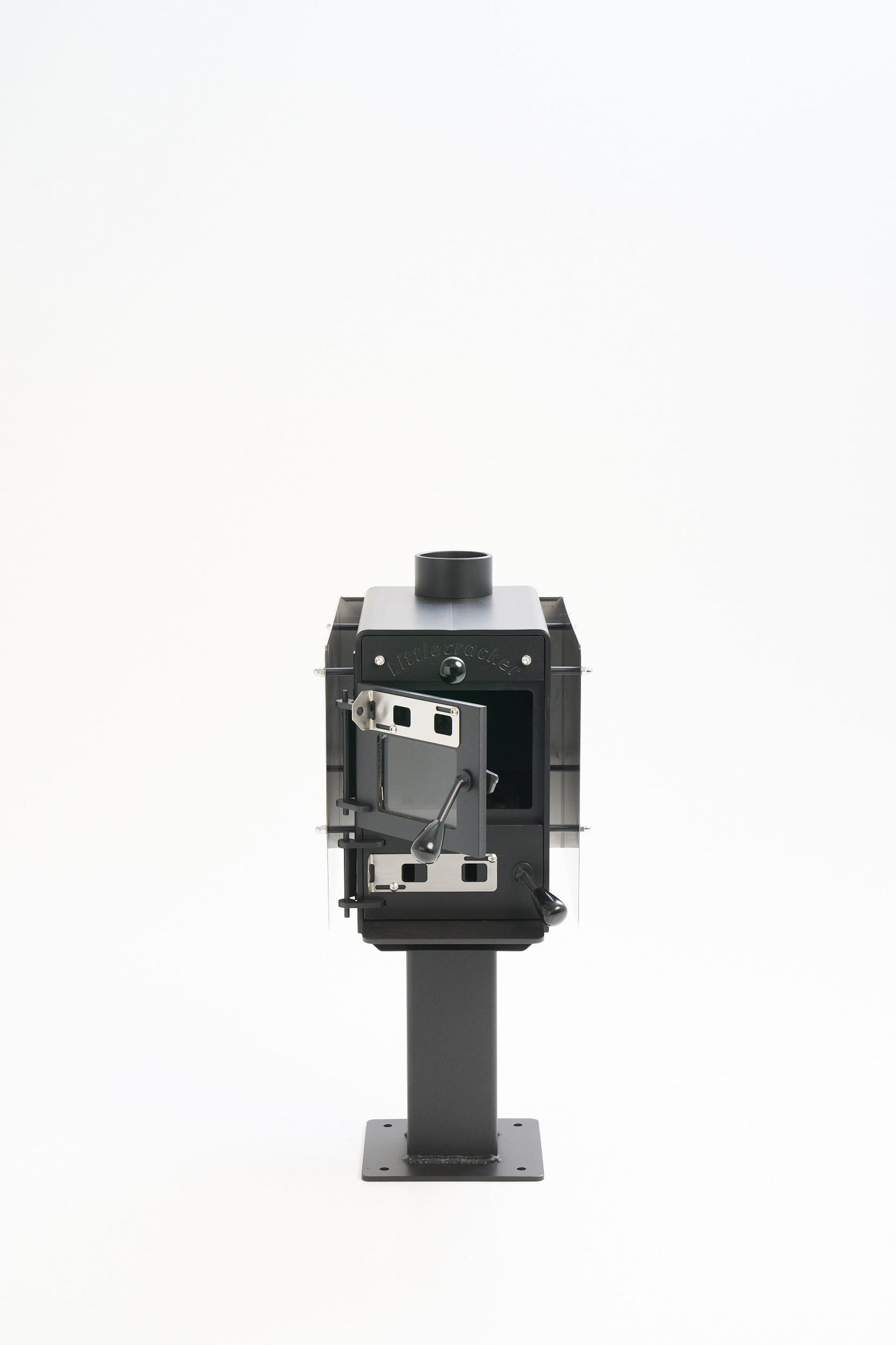 Little Cracker multi-fuel fire with flue system for compact spaces.