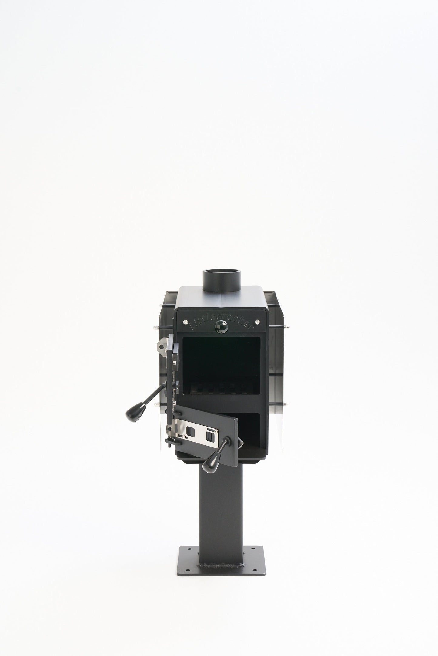 Little Cracker multi-fuel fire with 4M flue system, compact steel heater for homes and small spaces.