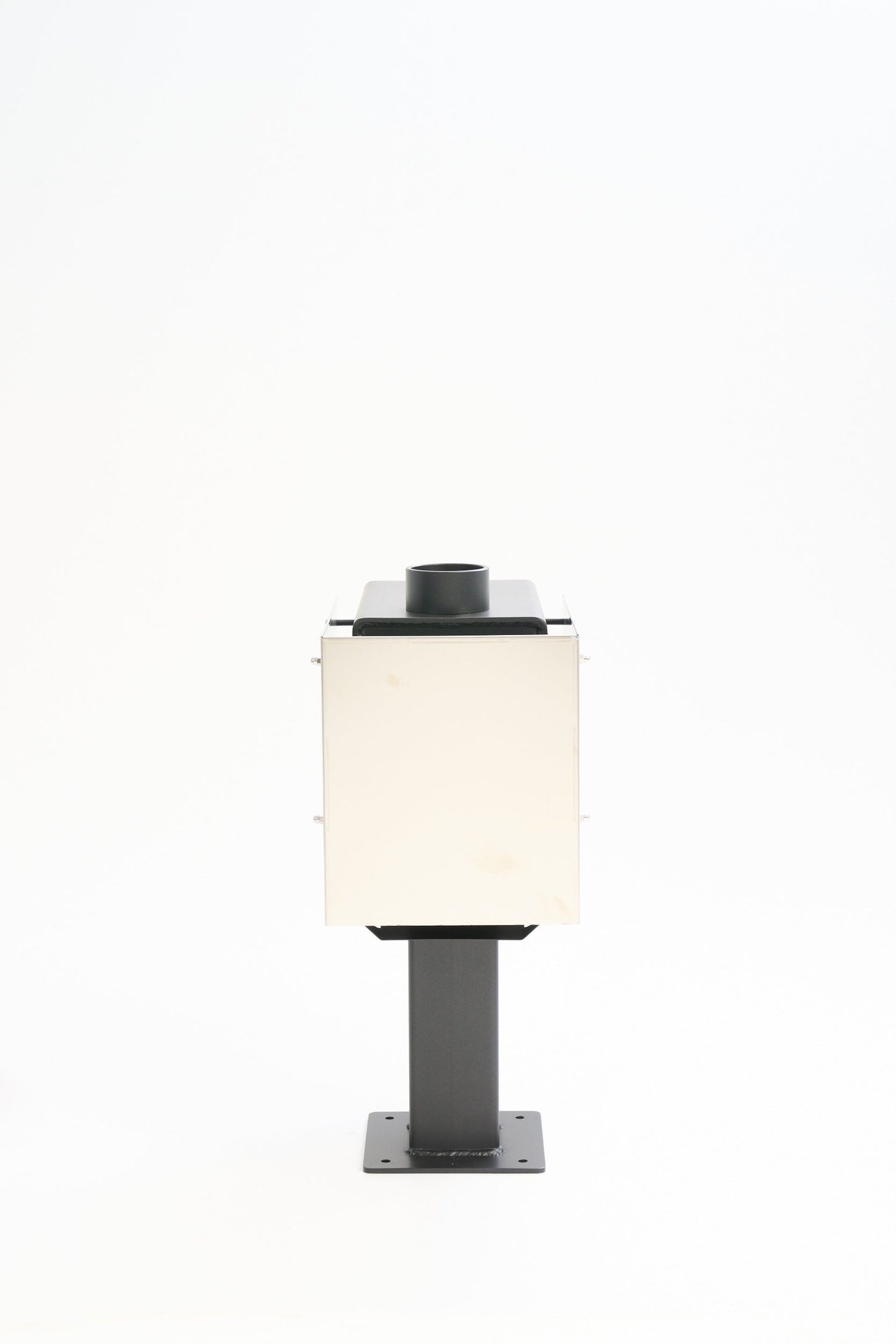 Little Cracker multi-fuel fire with flue system for dwelling installation.