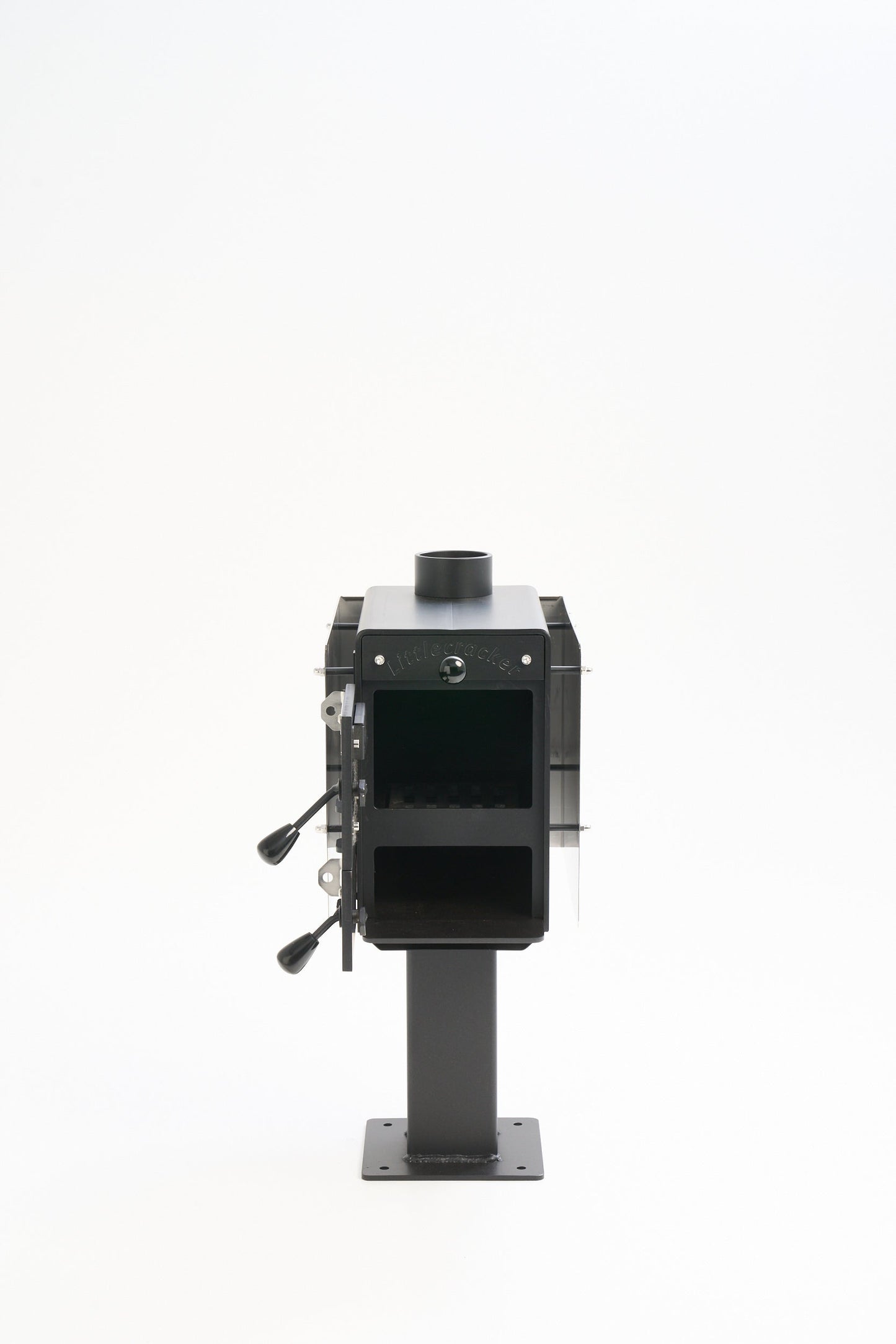 Compact Little Cracker multi-fuel fire with 4M flue system for small spaces like camper vans and tiny homes.