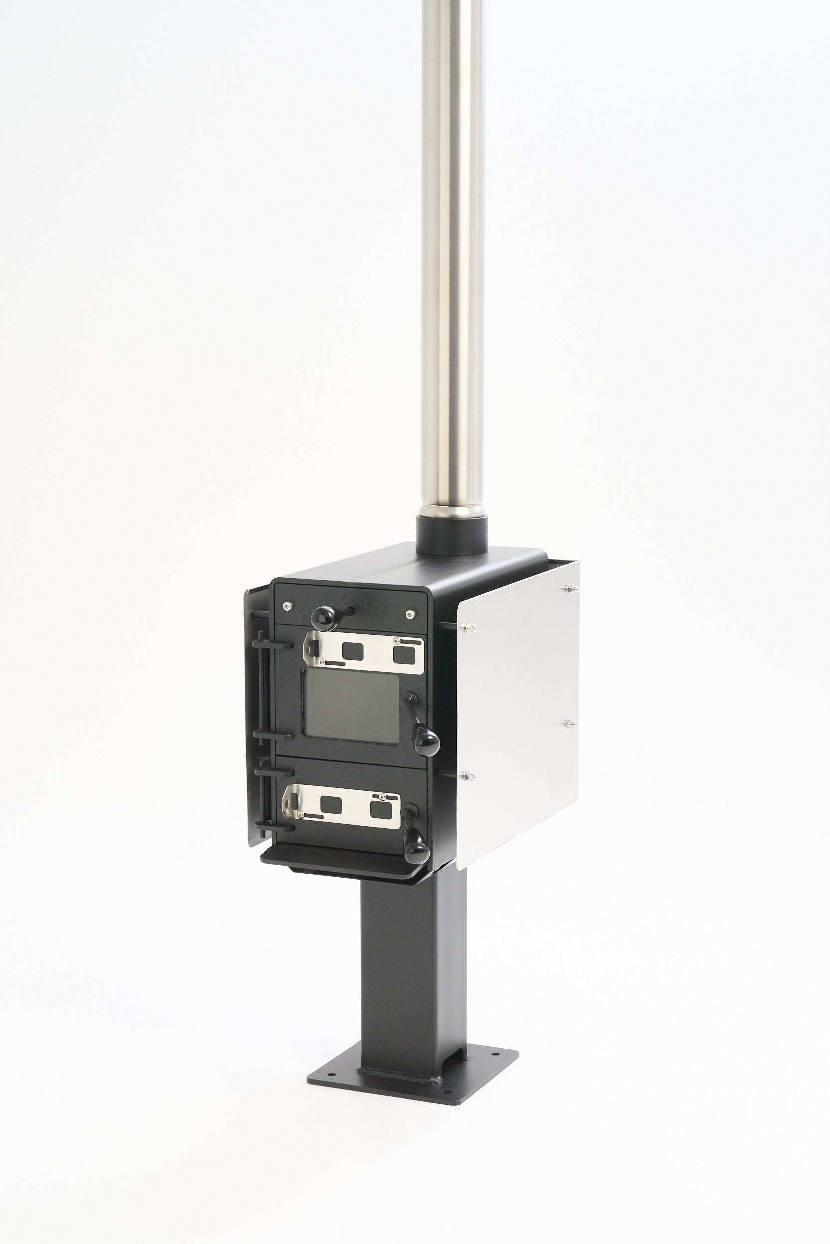 Little Cracker multi-fuel fire with 2M flue system for motorhomes.