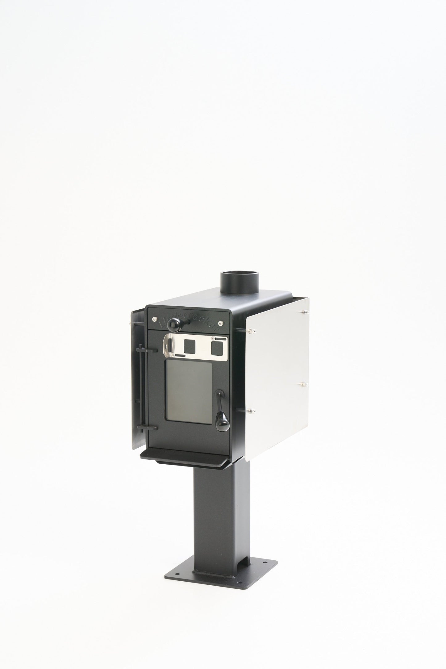 Compact Little Cracker Woody solid fuel heater with 2M flue system for motorhome installations.
