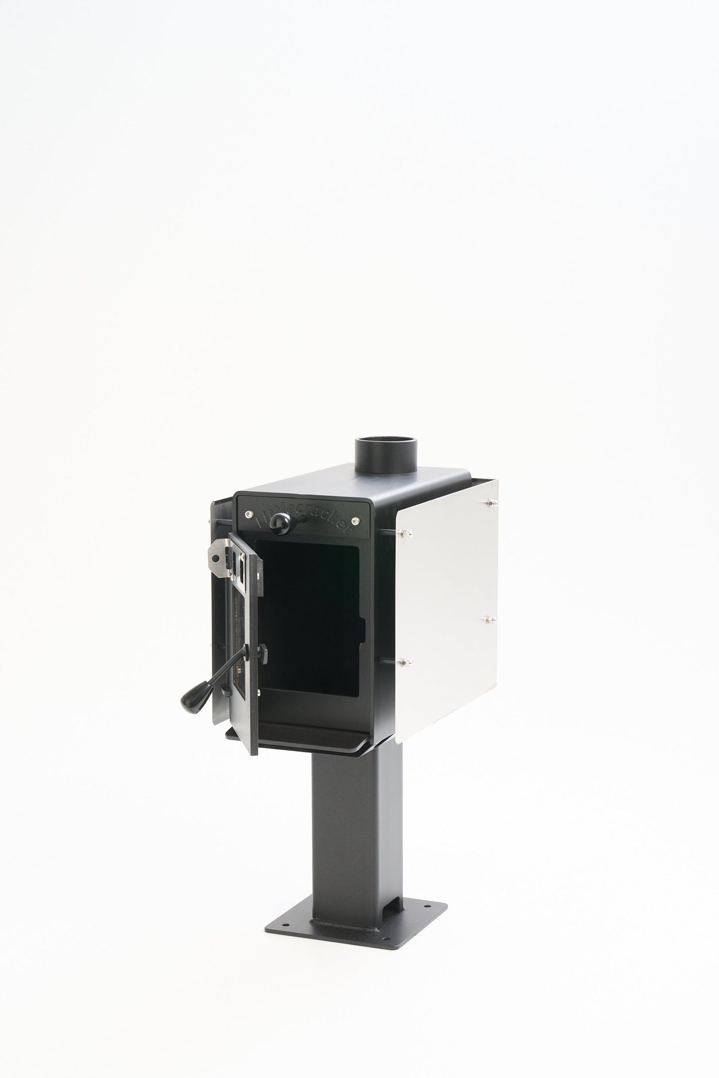 Little Cracker Woody solid fuel heater with 2m flue system for motorhome installation.