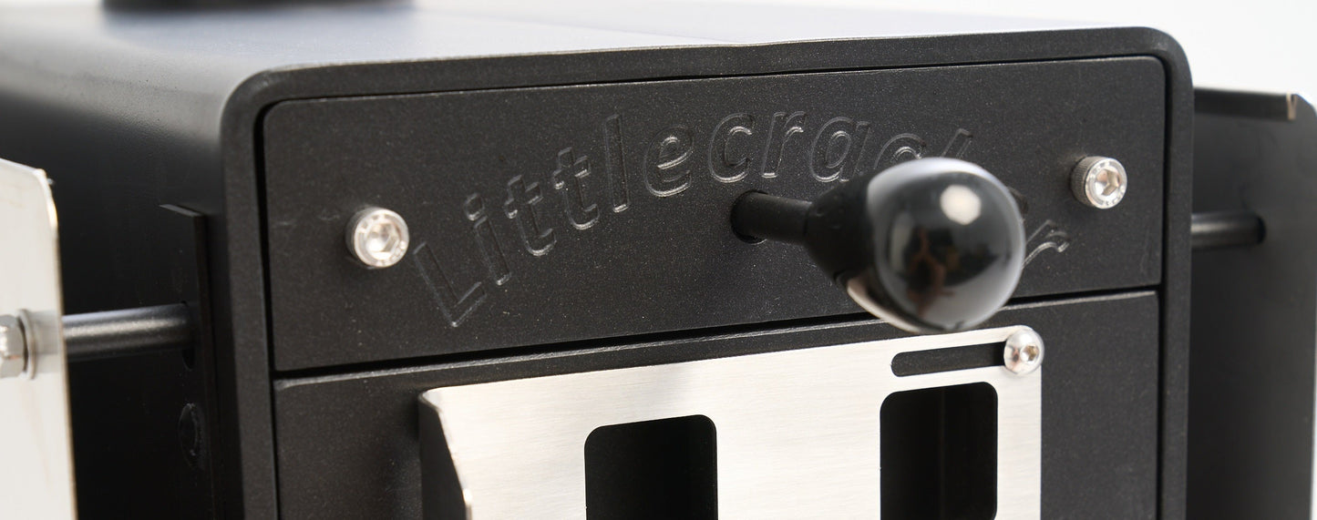 Close-up of the Little Cracker Woody solid fuel heater for motorhomes, showcasing details of the 2M flue system.