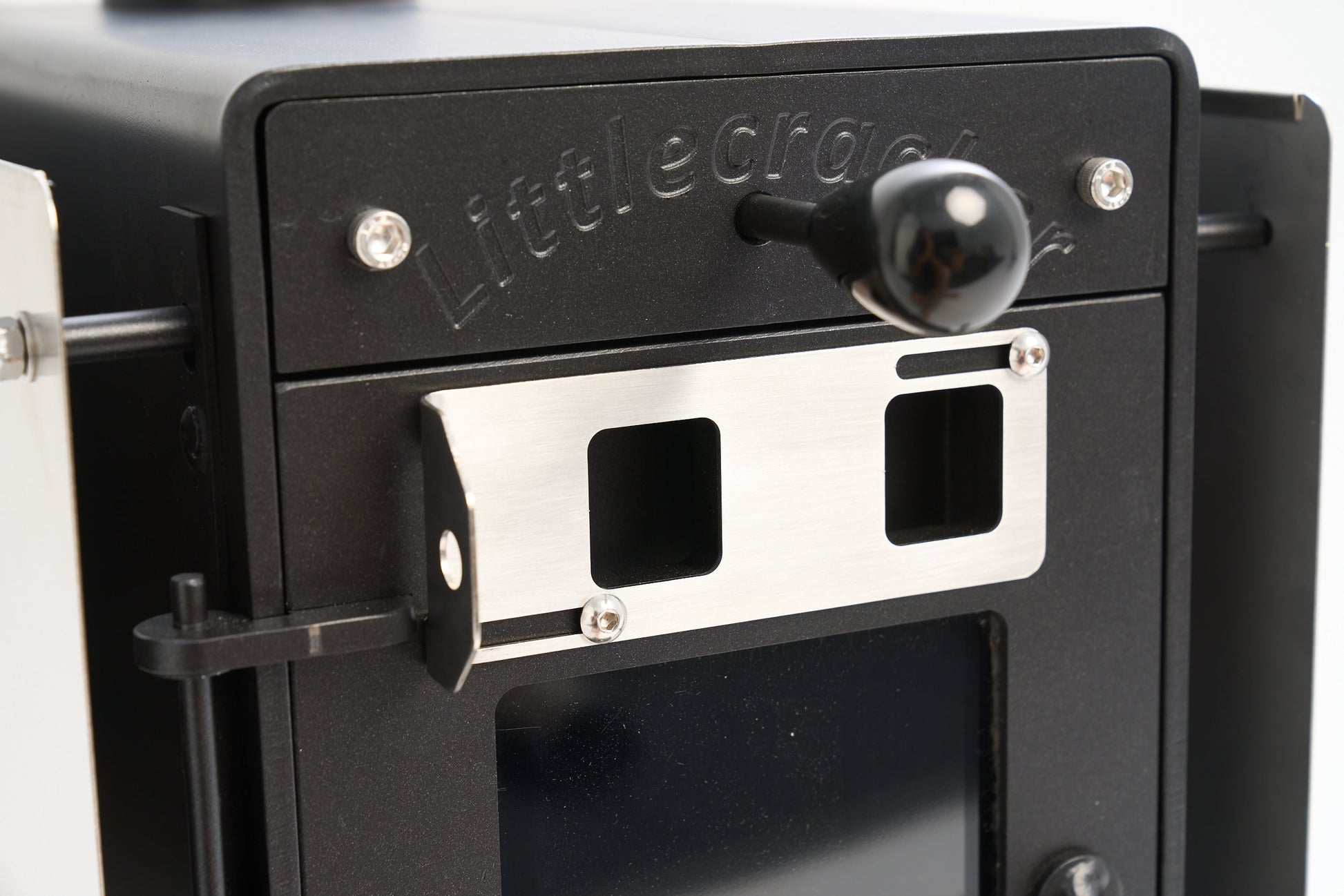 Little Cracker multi-fuel fire with flue system for motorhomes.