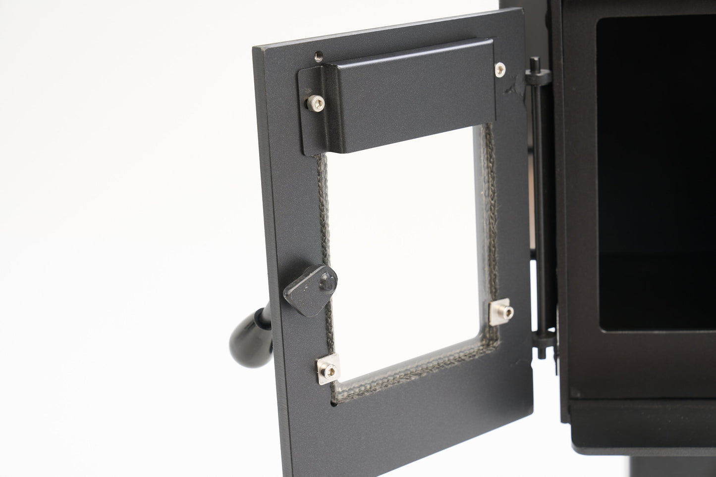 Little Cracker Woody door detail showing glass panel and handle for motorhome installation.