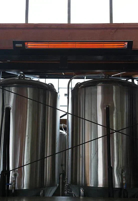 Infratech SL40 4kW Heater in Black Shadow installed above stainless steel tanks.