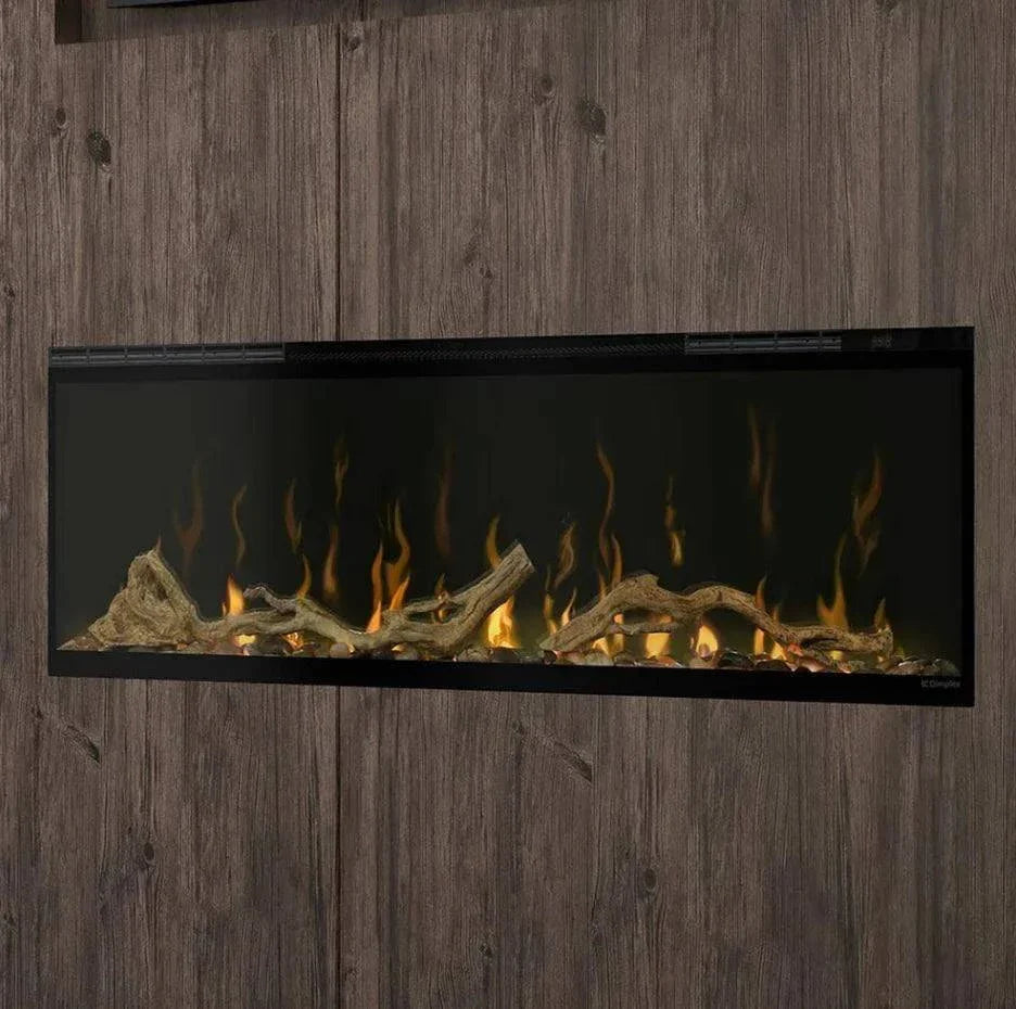 Driftwood and river rock media set in an electric fireplace.