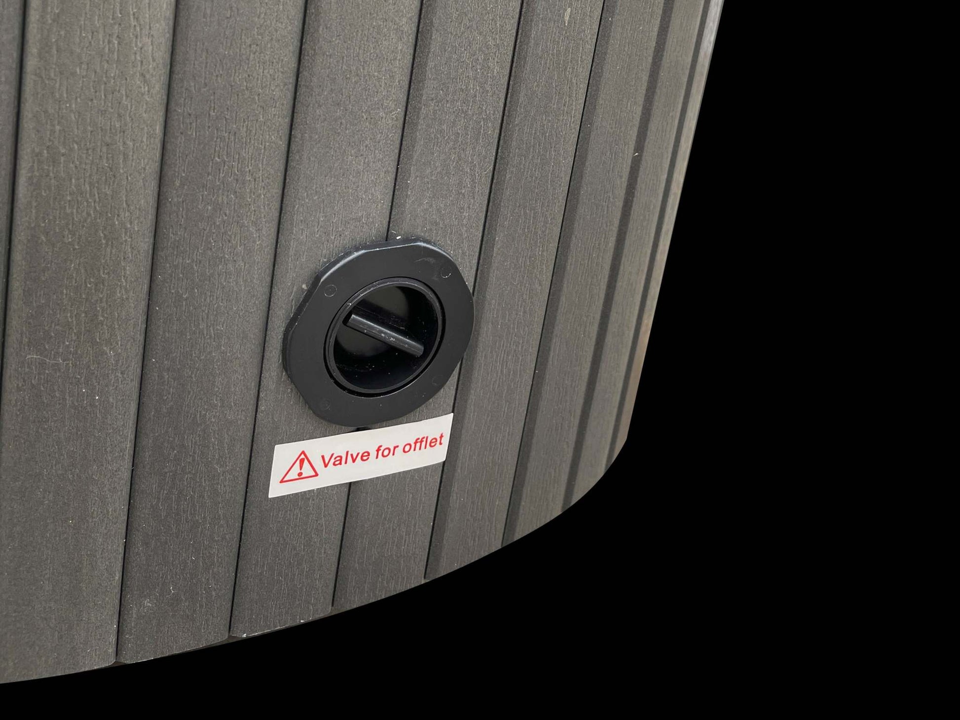 Close-up of Sensation Bliss 2 Spa Pool's exterior, featuring durable composite synthetic cabinet and valve.