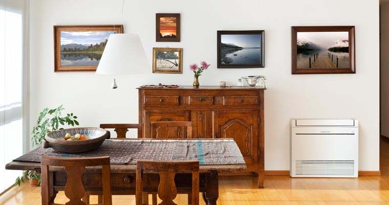 Mitsubishi RapidHeat MFZ-KW42VG heat pump in a stylish dining room setting.