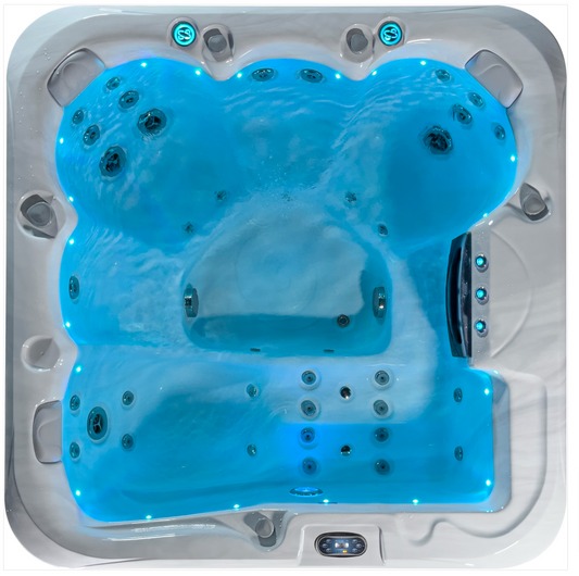 Sensation Oasis 6 person spa pool with blue LED lights and multiple jets for enhanced relaxation.