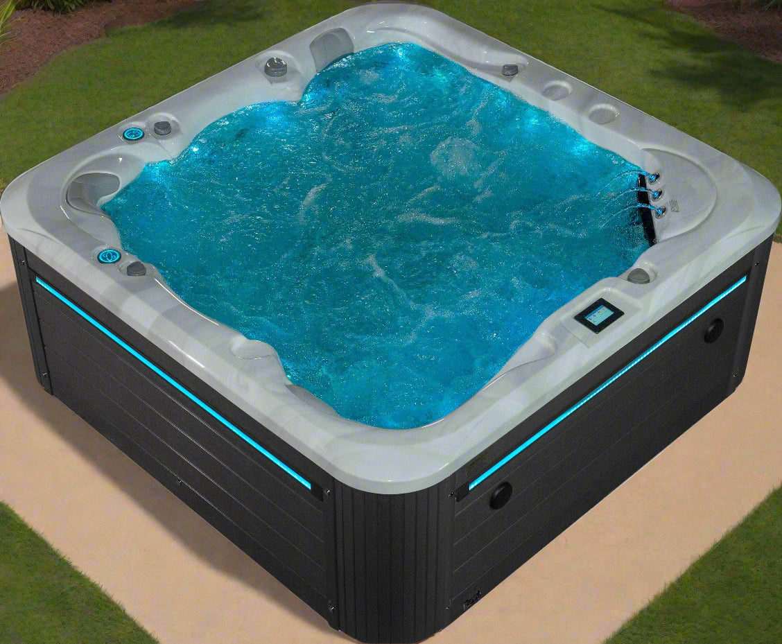 Sensation Tranquility 5-person spa pool with LED lights and ergonomic design for relaxation.