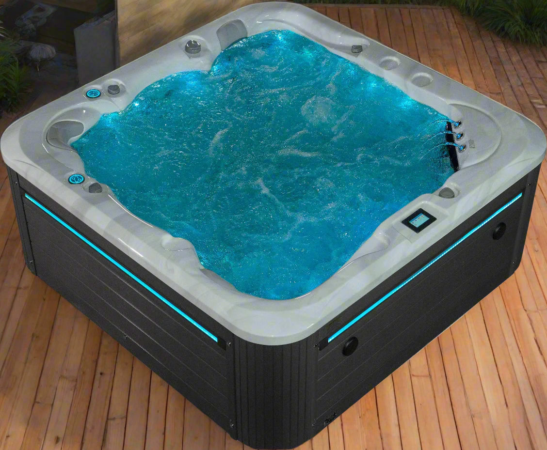 Sensation Tranquility 5-person spa pool with LED lights and ergonomic design for relaxation.