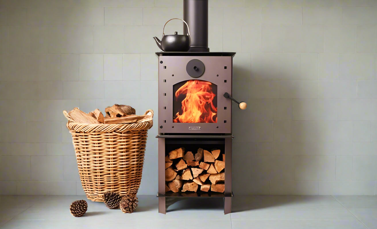 Warmington BROWN Studio 14 woodburner with flue, burning fire, wood storage.