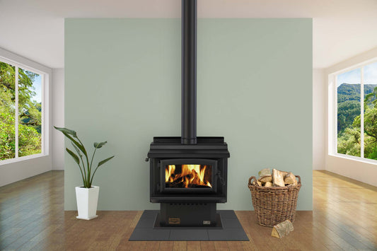 Woodsman Tarras MKIII fireplace with 4.2m Heatsaver flue system in a modern living room.