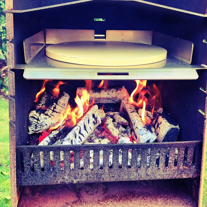 Pizza kit for Obelisk outdoor fire with pizza stone and peel.