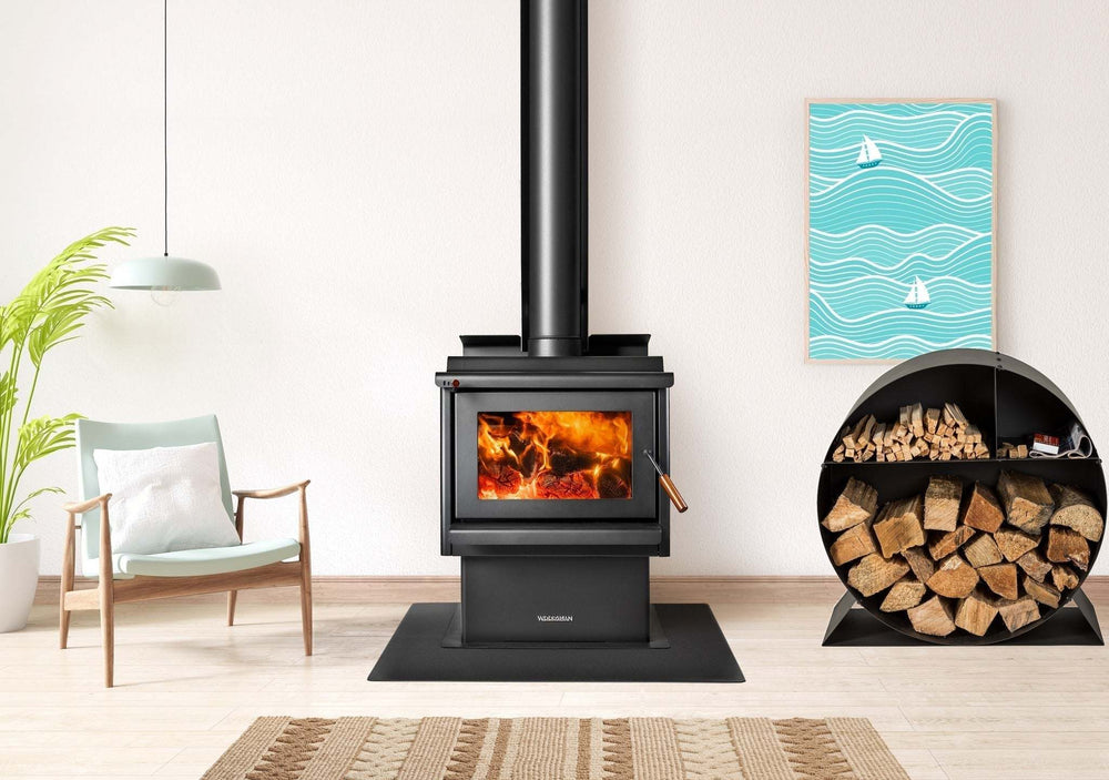 Woodsman Wood Storage Bin next to modern stove in cozy living room setting.