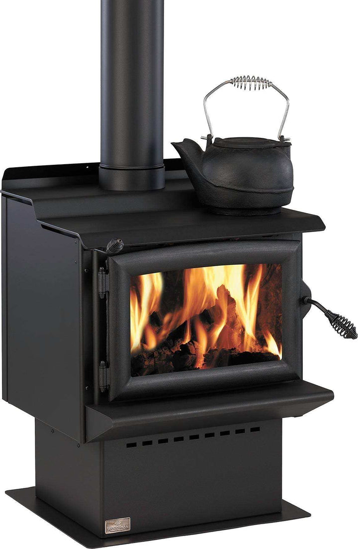 Solid freestanding Woodsman Tasman MKII burner with 4.2m Heatsaver flue system.