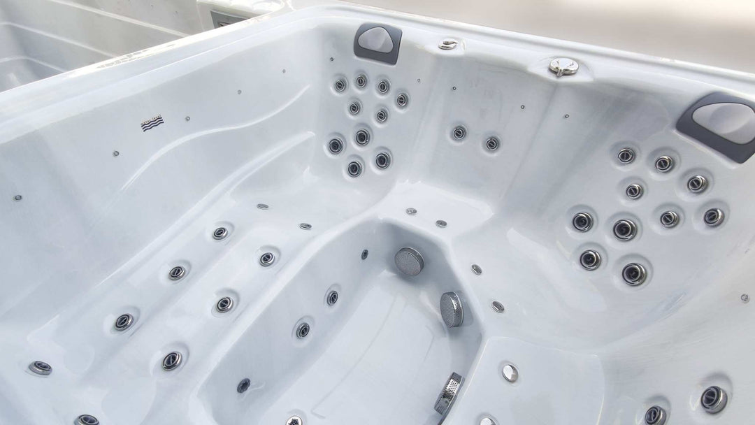 Sensation Euphoria 5.9m Pro Swim Spa interior with hydrotherapy jets and ergonomic seating.