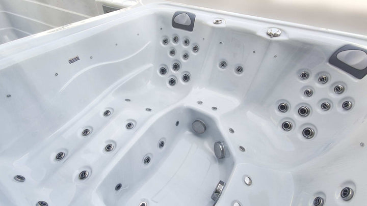 Sensation Euphoria 5.9m Pro Swim Spa interior with hydrotherapy jets and ergonomic seating.