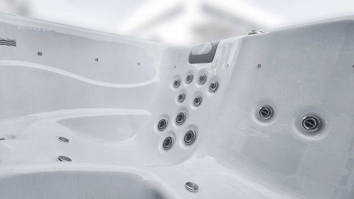 Close-up view of Sensation Euphoria 5.9m Pro Swim Spa hydrotherapy jets and seating area.