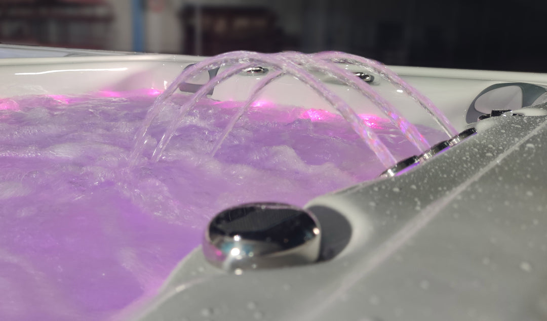 Sensation Euphoria 5.9m Pro Swim Spa with illuminated water jets and hydrotherapy features.