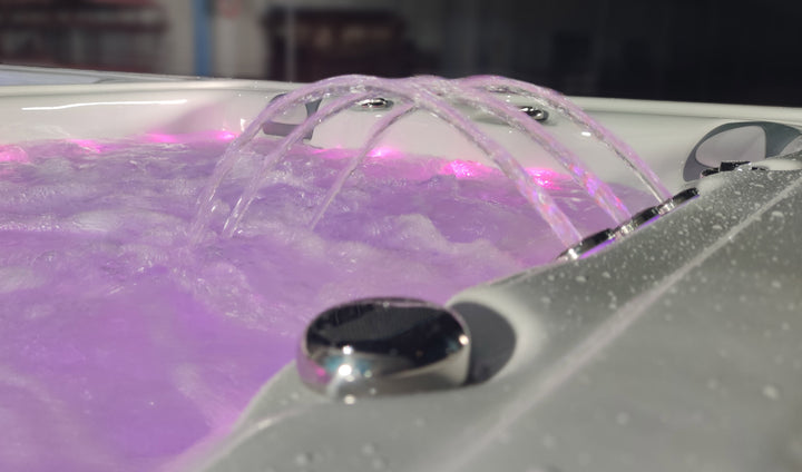 Sensation Euphoria 5.9m Pro Swim Spa with illuminated water jets and hydrotherapy features.