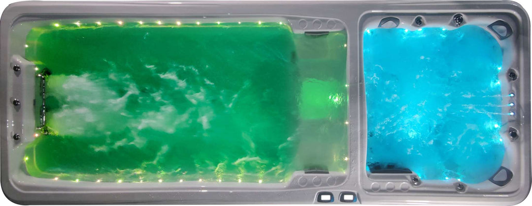 Sensation Euphoria 5.9m Pro Swim Spa with vibrant LED lights displaying powerful swim and hydrotherapy jets.