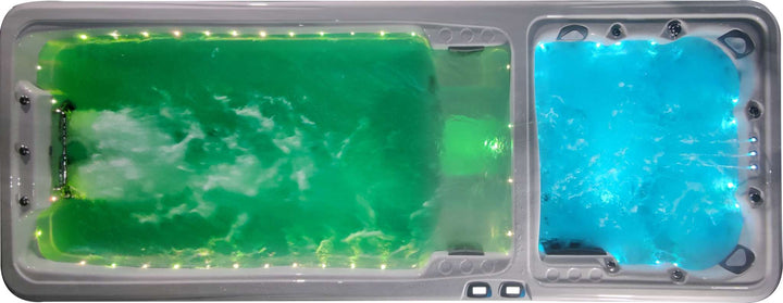 Sensation Euphoria 5.9m Pro Swim Spa with vibrant LED lights displaying powerful swim and hydrotherapy jets.