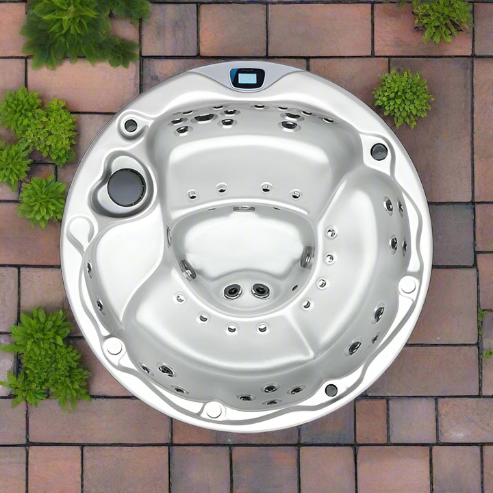 Sensation Lagoon hot tub with ergonomic seating, LED lights, and advanced control panel.