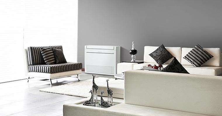Mitsubishi RapidHeat MFZ-KW42VG 5.4kw floor console heat pump in modern living room.