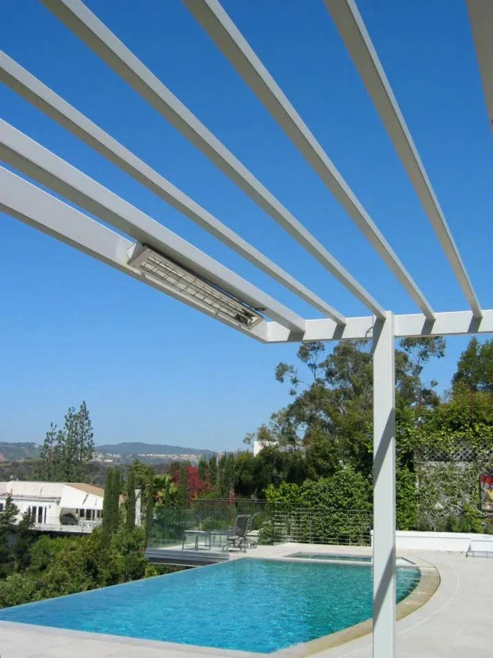 Infratech CD5024 5kW outdoor heater mounted on a patio structure near a pool.