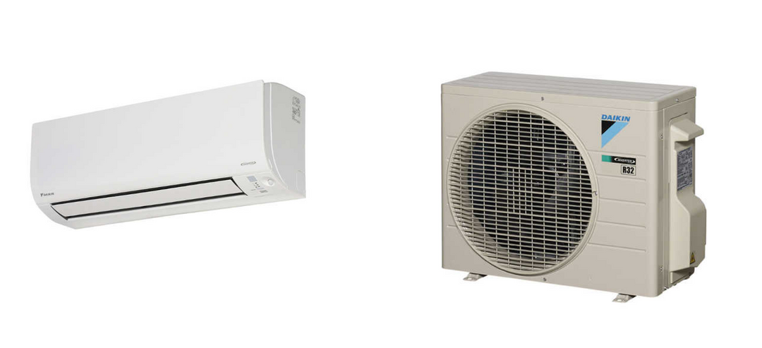 Daikin Cora FTXV25UVMA heat pump and air conditioner with white indoor and outdoor units.