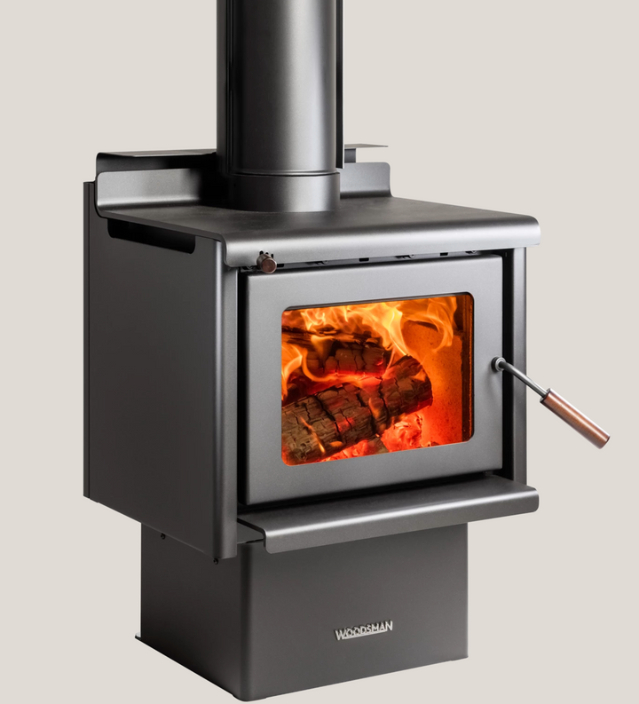 Woodsman Kanaku pedestal fireplace with 4.2m Heatsaver flue system in use.