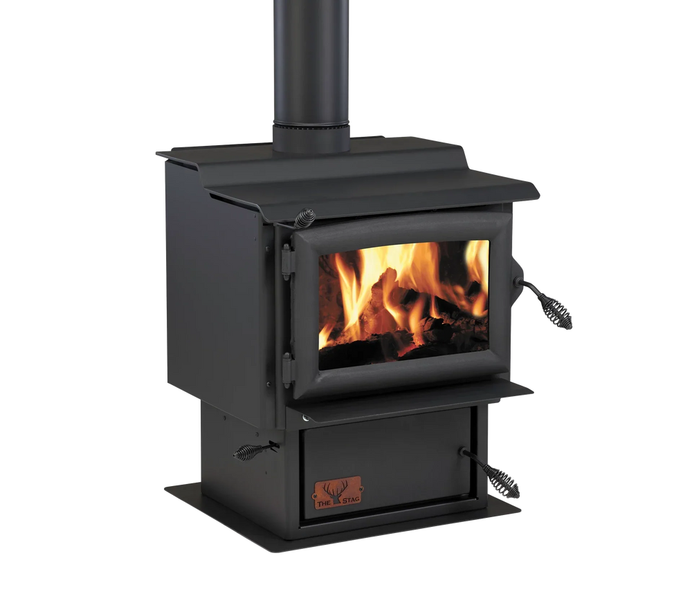 Woodsman Stag Multi-Fuel Fire with Heatsaver Flue System, burning flames visible.
