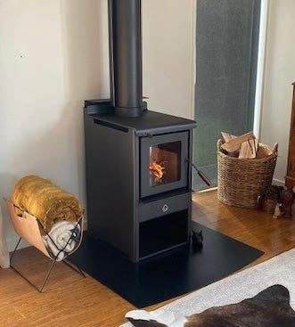 Woodsman Serene Petite ULEB fireplace with 4.2m Heatsaver Flue in modern home setting in christchurch