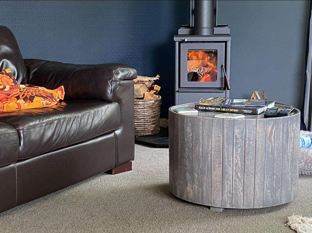 Serene drawer base wood burner installed into a corner