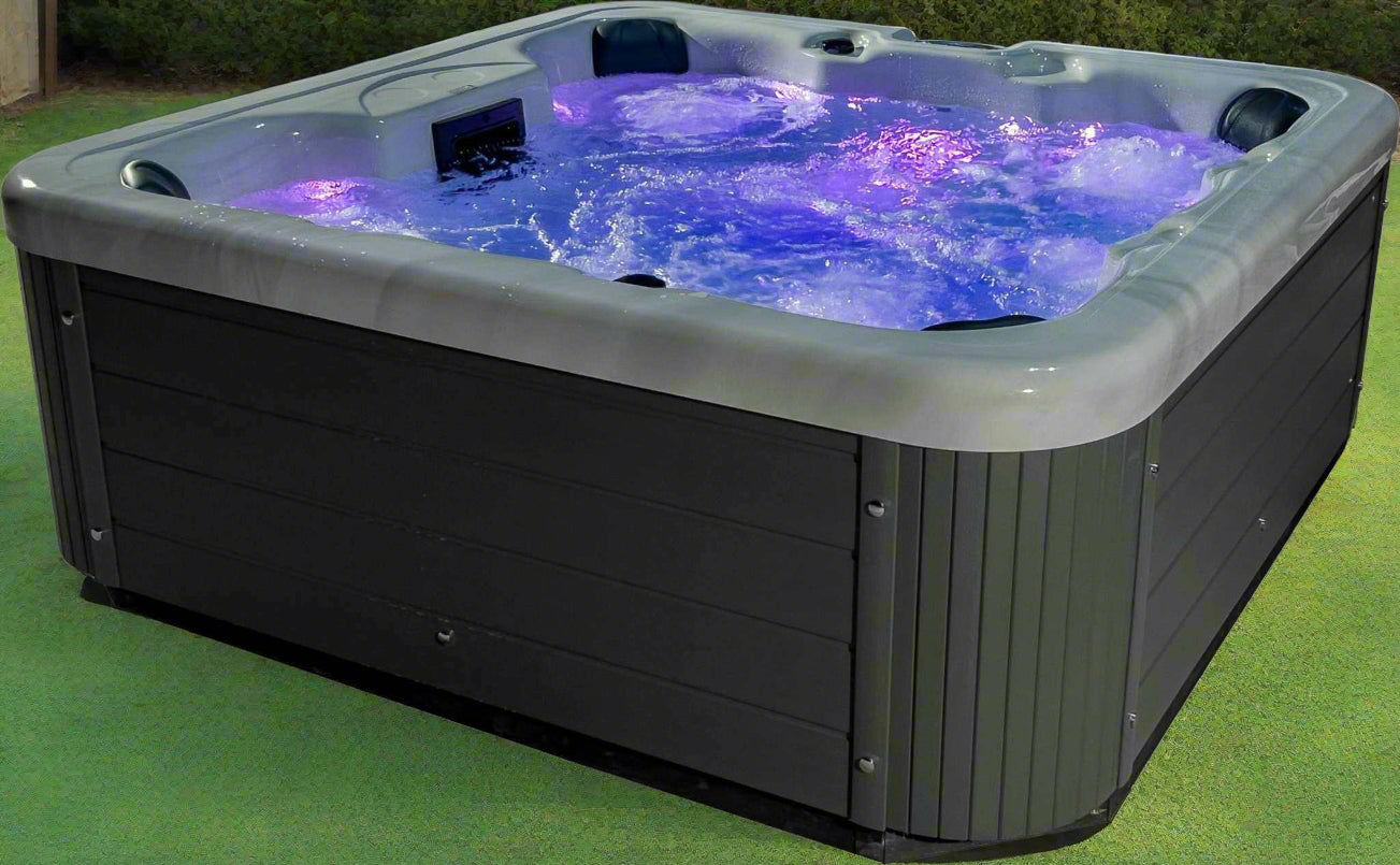 Sensation Bliss 3 All Seater Spa Pool with hydrotherapy jets and LED lights in a modern design.