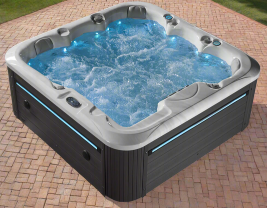 Sensation Oasis retreat spa pool with LED lights and acrylic shell.