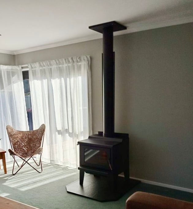 nz made woodsman coleridge on leg base installation in a lounge in christchurch