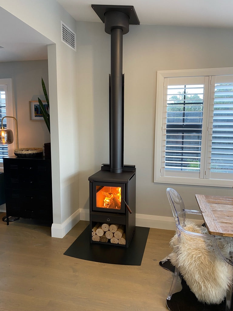 woodsman serene uleb installed on black hearth