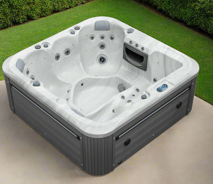 Sensation 6 person spa pool with jets, lounger, and LED lights.